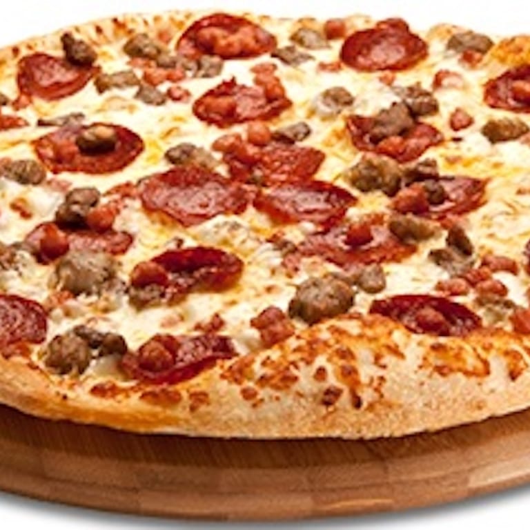 Indulge in Our Meat Lovers Pizza